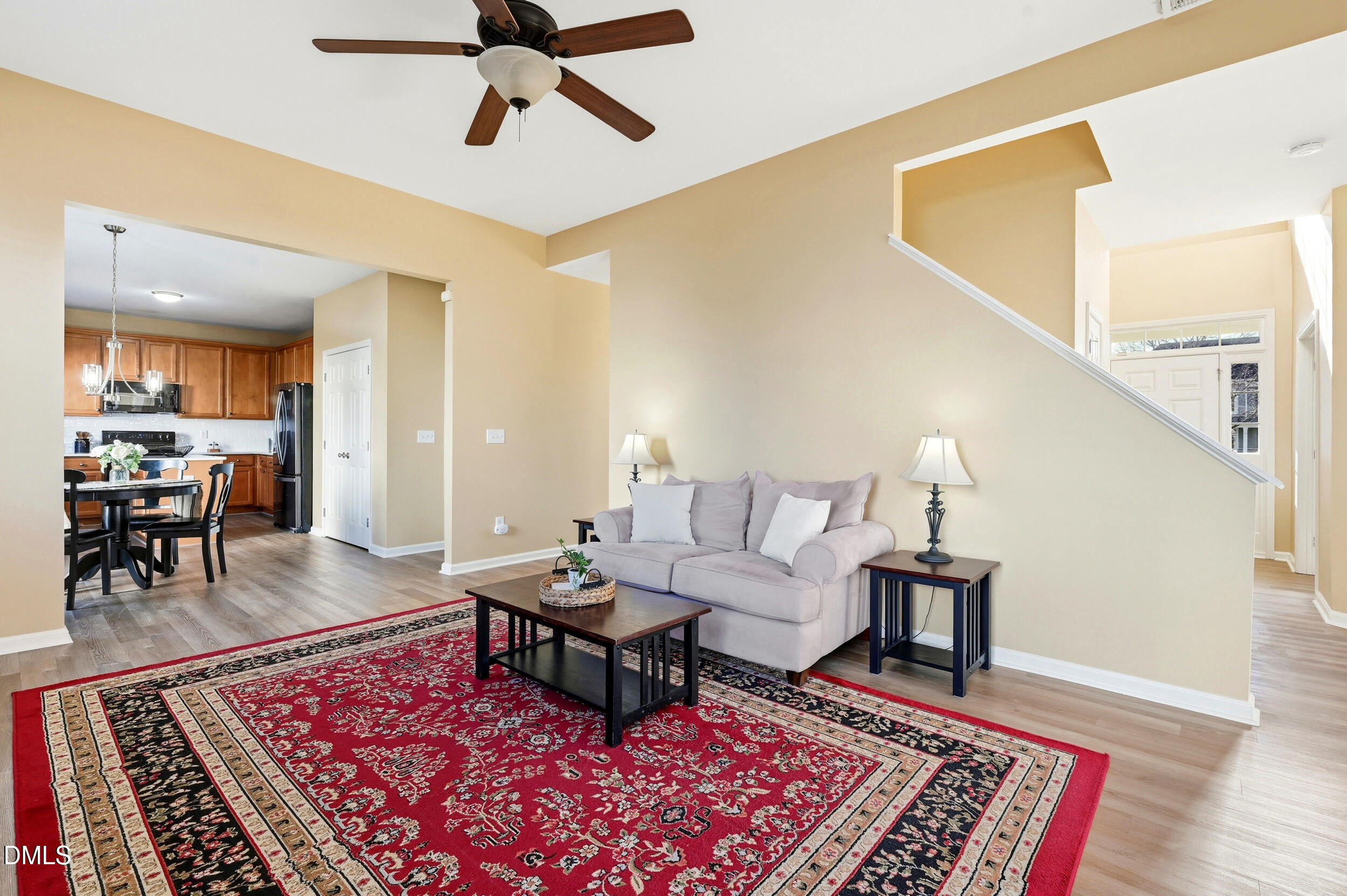 5401 Onyx Mill Court Raleigh, NC 27616 - Photo 15 of 48 a living room with furniture and a rug