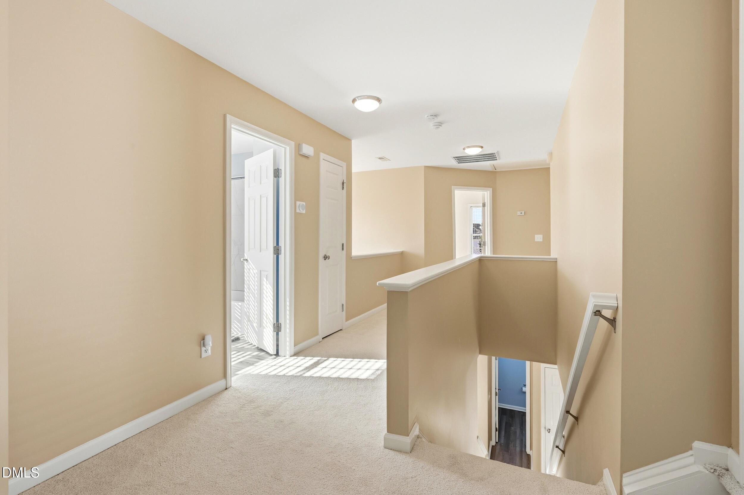 5401 Onyx Mill Court Raleigh, NC 27616 - Photo 23 of 48 a view of a hallway with furniture