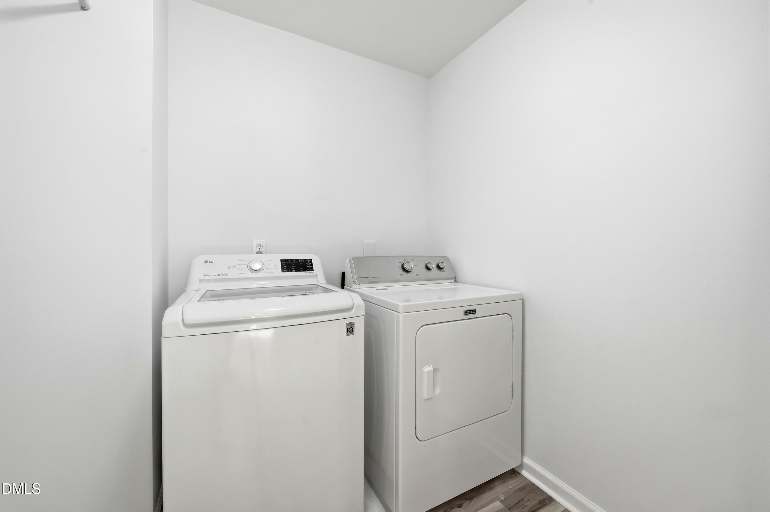 5401 Onyx Mill Court Raleigh, NC 27616 - Photo 24 of 48 a utility room with dryer and washer