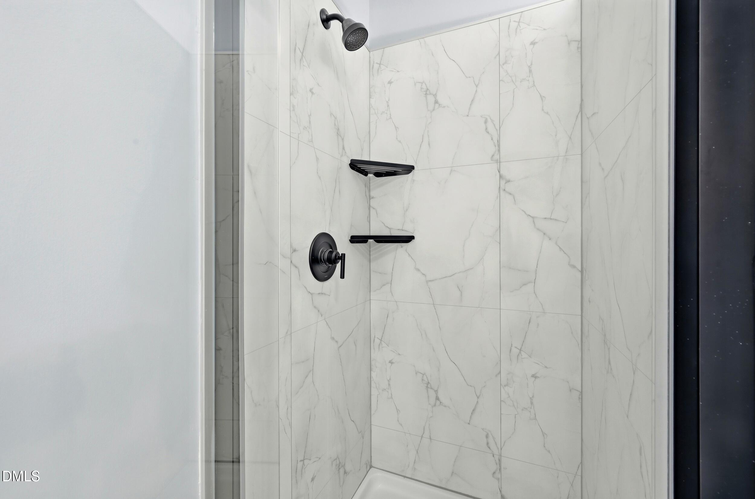 5401 Onyx Mill Court Raleigh, NC 27616 - Photo 29 of 48 a bathroom with a shower