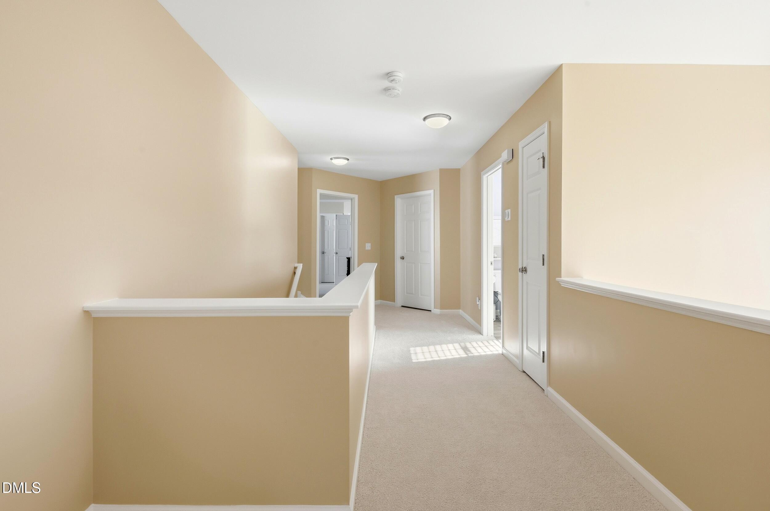 5401 Onyx Mill Court Raleigh, NC 27616 - Photo 32 of 48 a view of a livingroom with wooden floor