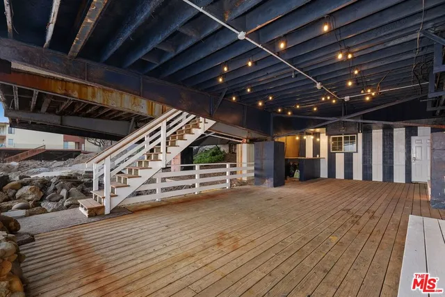 a view of a big room with wooden roof