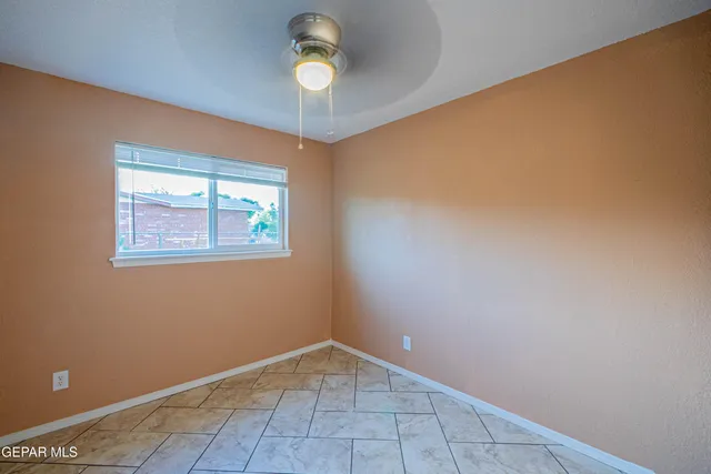 an empty room with a window