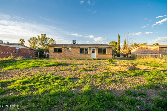 a view of a house with a big yard
