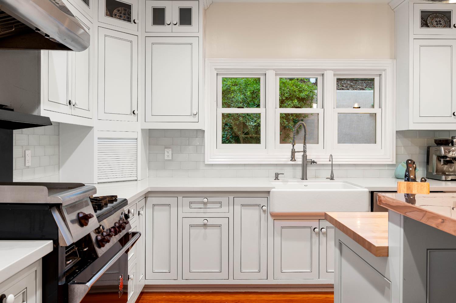 990 Thompson Way Placerville, CA 95667 - Photo 40 of 70 a kitchen with granite countertop a sink stainless steel appliances and cabinets