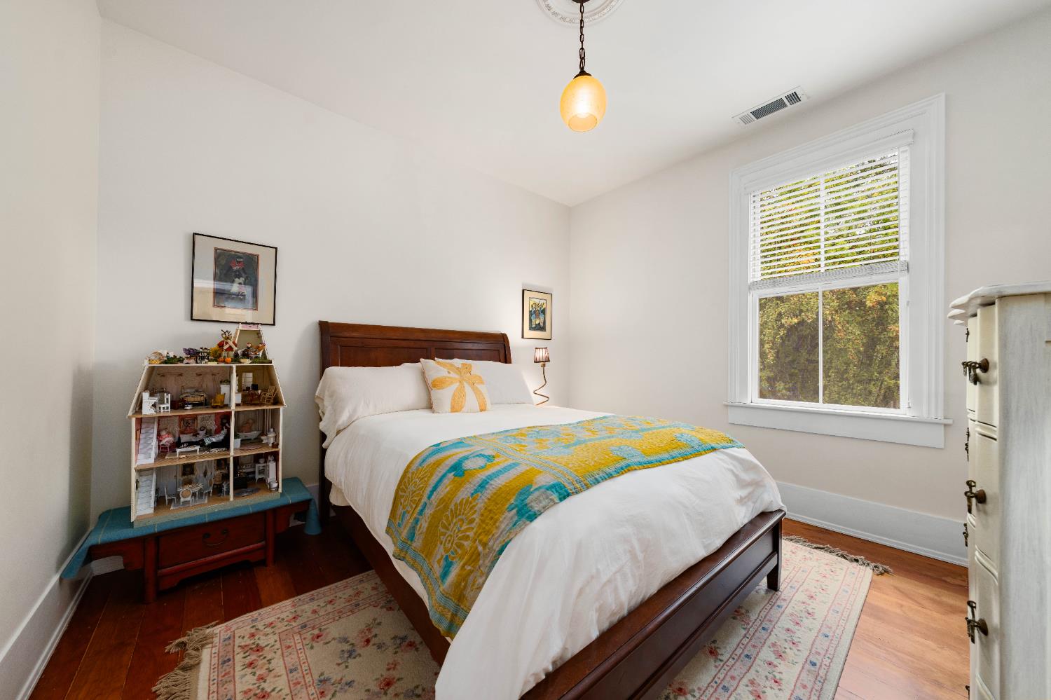 990 Thompson Way Placerville, CA 95667 - Photo 47 of 70 a bedroom with a bed a dresser and a window