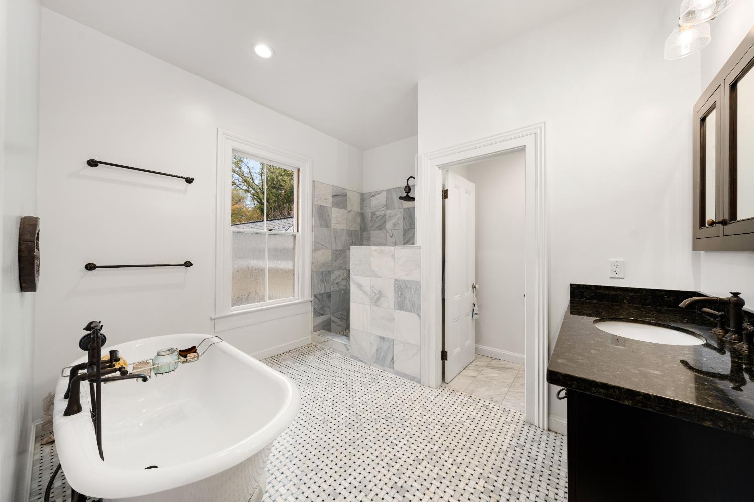 990 Thompson Way Placerville, CA 95667 - Photo 49 of 70 a bathroom with a sink and a mirror