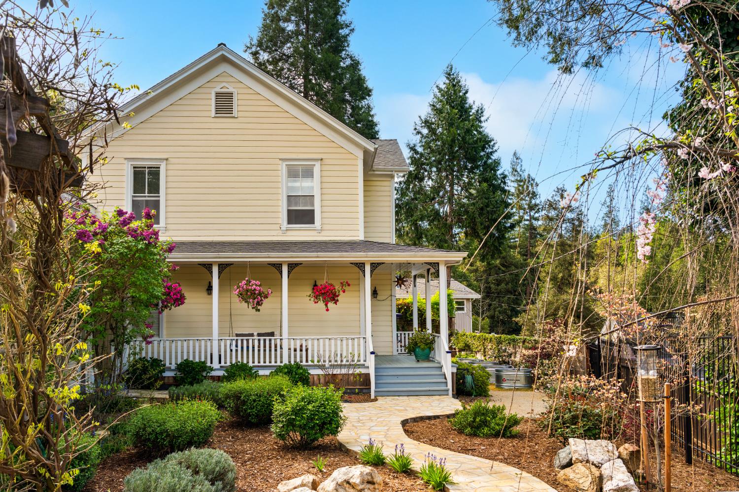 990 Thompson Way Placerville, CA 95667 - Photo 55 of 70 a front view of a house with garden
