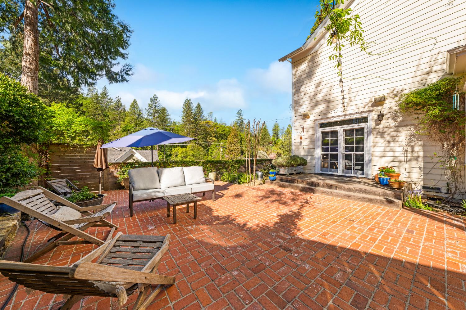 990 Thompson Way Placerville, CA 95667 - Photo 60 of 70 a view of swimming pool with outdoor seating and trees