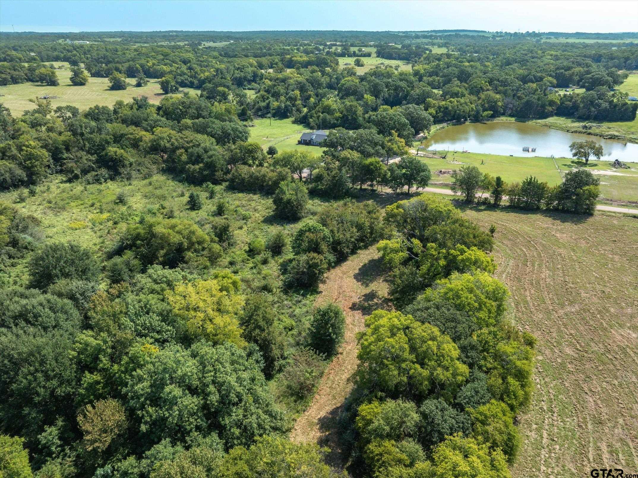 2411 VZ County Road Canton, TX 75103 - Photo 12 of 12 an aerial view of a houses with a yard and lake view