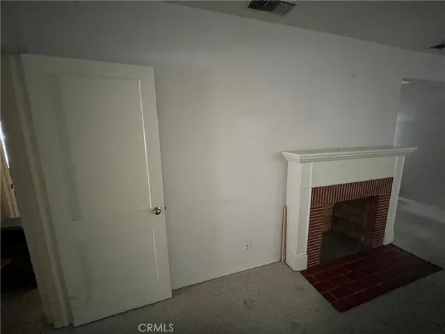 a living room with a fireplace