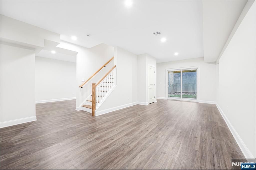 18 Birdie Lane Boonton, NJ 07005 - Photo 23 of 36 a view of an entryway with wooden floor