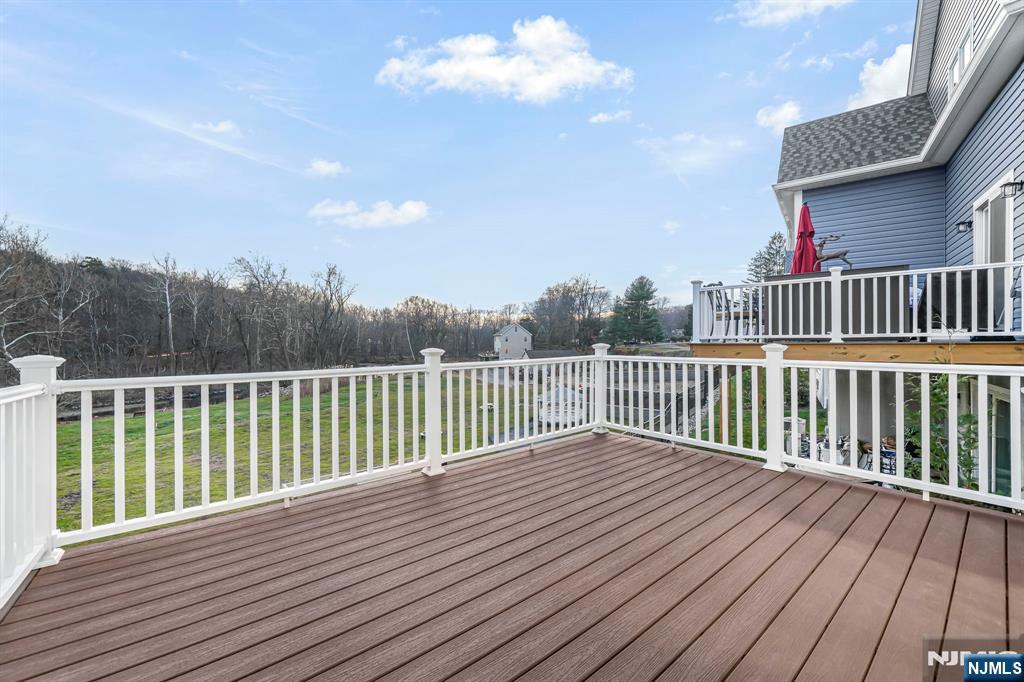 18 Birdie Lane Boonton, NJ 07005 - Photo 26 of 36 a view of balcony with wooden floor