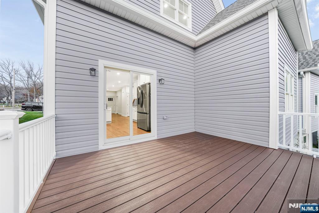 18 Birdie Lane Boonton, NJ 07005 - Photo 27 of 36 a view of a hallway with wooden floor