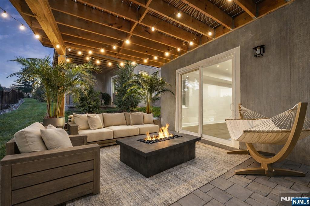 18 Birdie Lane Boonton, NJ 07005 - Photo 4 of 36 a outdoor living space with furniture and a potted plant