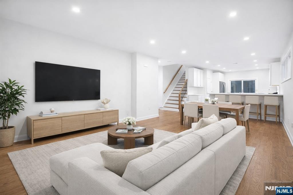 18 Birdie Lane Boonton, NJ 07005 - Photo 5 of 36 a living room with furniture and a flat screen tv