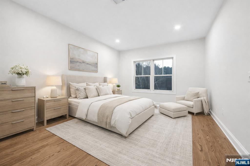 18 Birdie Lane Boonton, NJ 07005 - Photo 6 of 36 a bedroom with bed and window