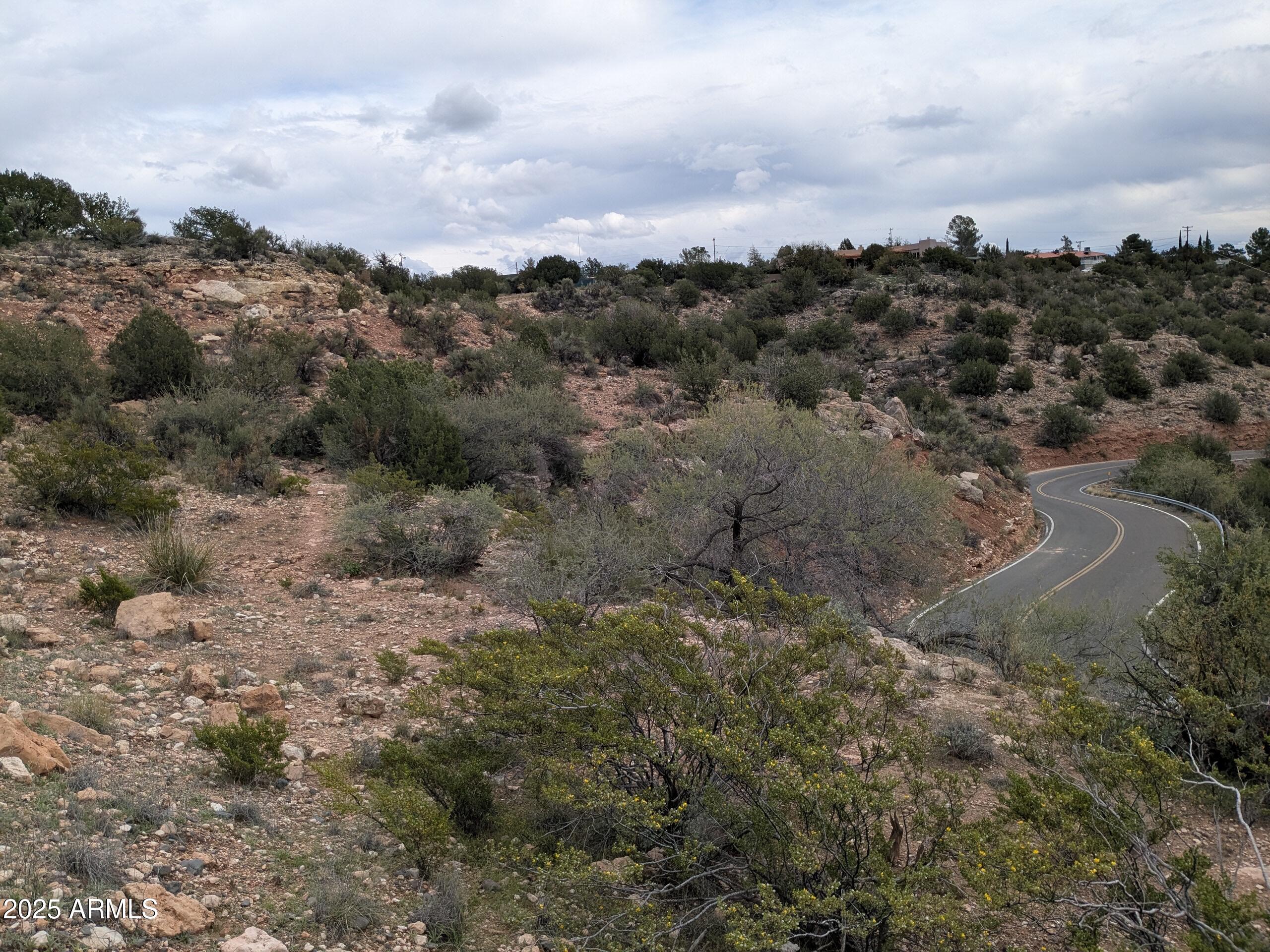 4425 East Cliffside Trail, Unit 101 Rimrock, AZ 86335 - Photo 3 of 9 an aerial view of houses covered in trees