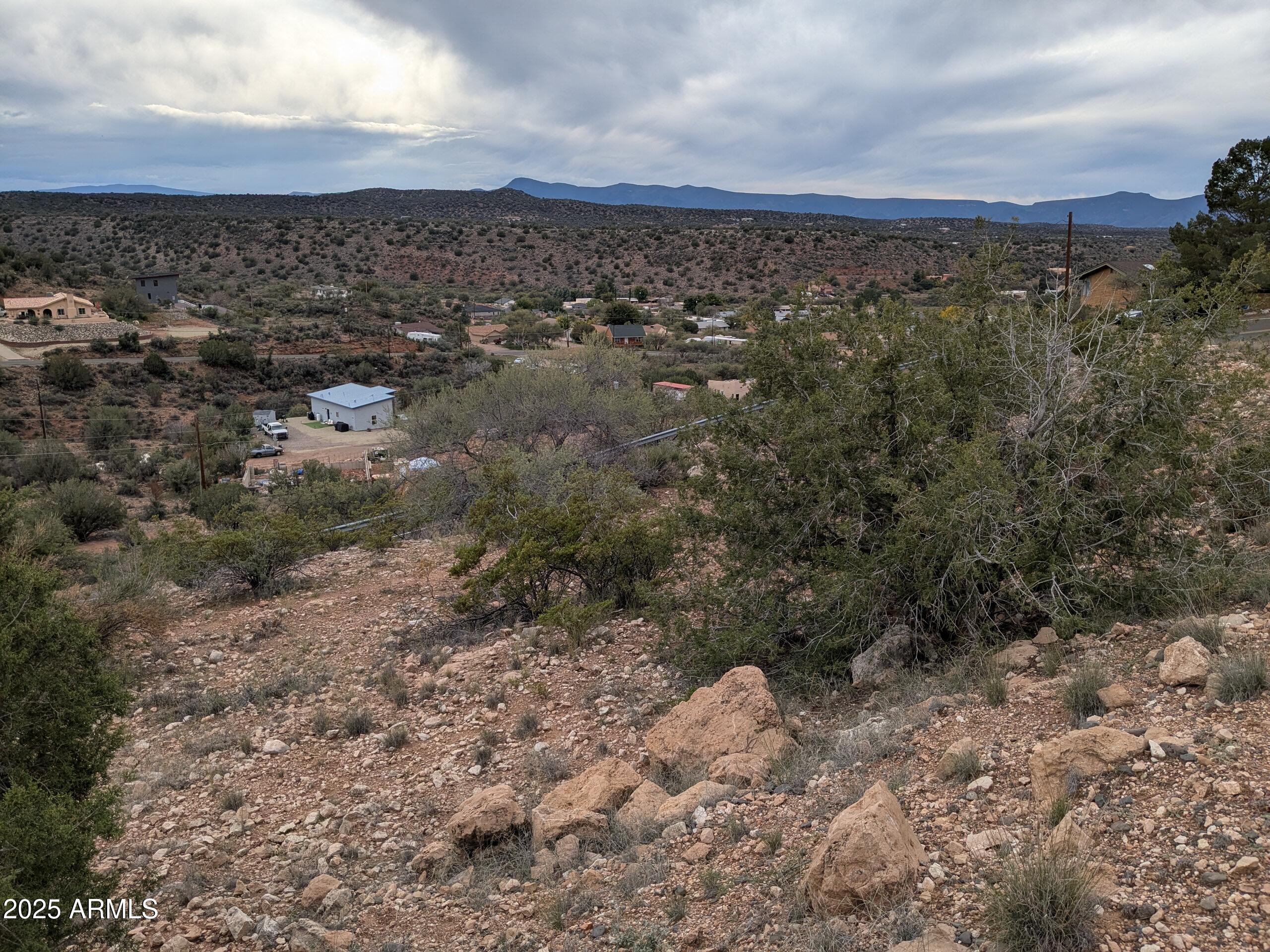 4425 East Cliffside Trail, Unit 101 Rimrock, AZ 86335 - Photo 8 of 9 a view of a large green field
