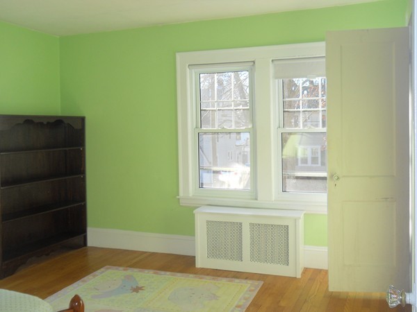 73 Perkins Street Springfield, MA 01118 - Photo 11 of 17 a view of an empty room and window