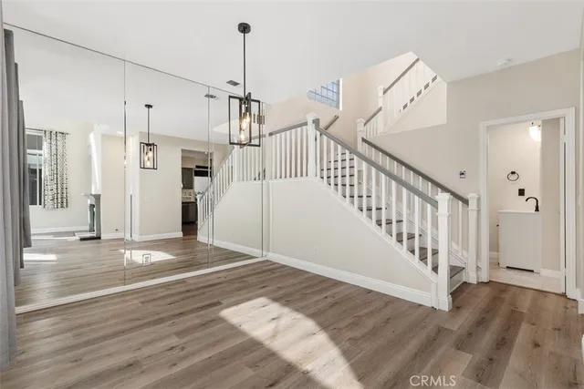 a view of a hallway view with staircase