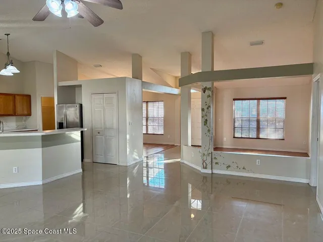 a large spacious bathroom with a large tub and shower