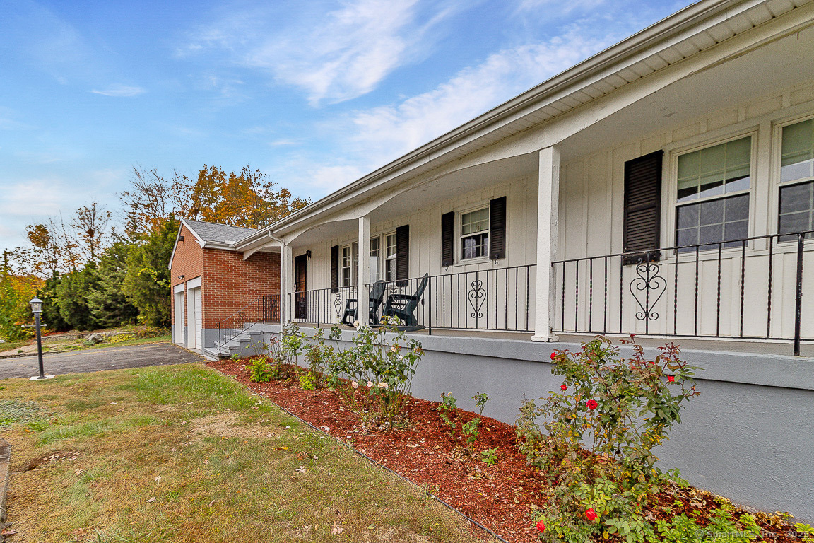 97 Longview Drive Berlin, CT 06037 - Photo 2 of 39 front view of a house with a yard