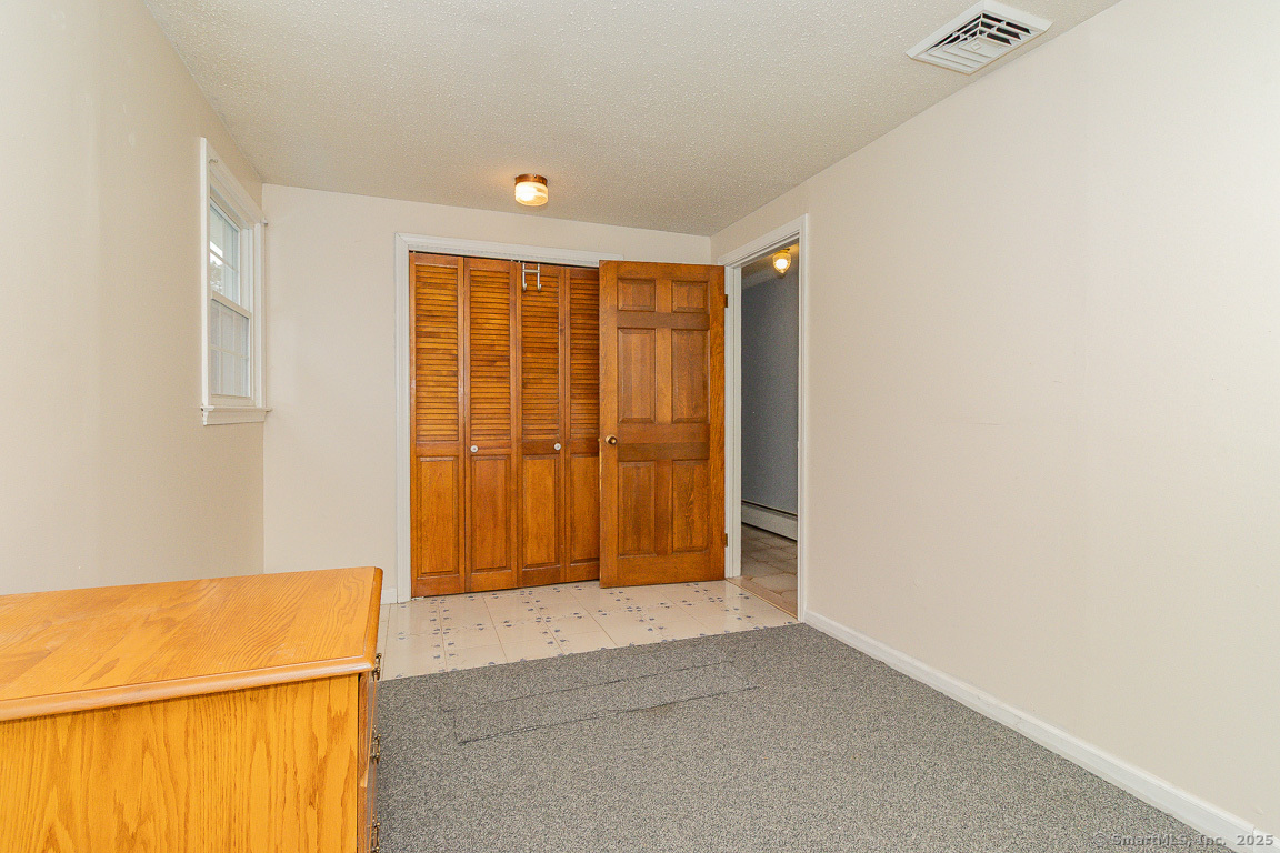 97 Longview Drive Berlin, CT 06037 - Photo 26 of 39 a view of an empty room with a window