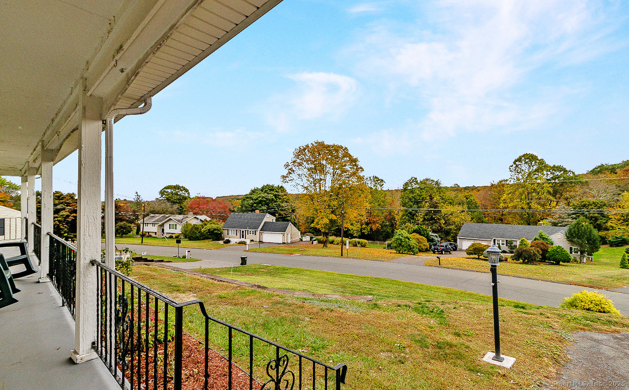 97 Longview Drive Berlin, CT 06037 - Photo 39 of 39 a view of swimming pool with outdoor seating and city view