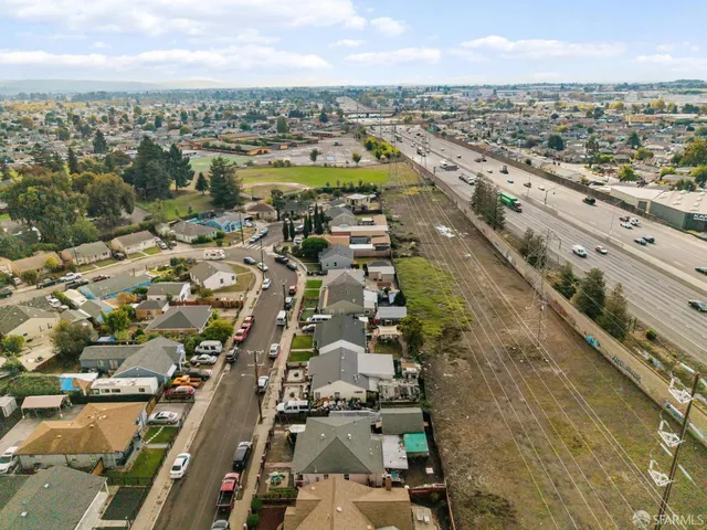 an aerial view of a city with lots of residential buildings