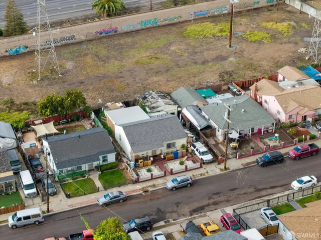 an aerial view of a houses with outdoor space