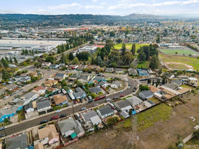 an aerial view of residential building and lake view
