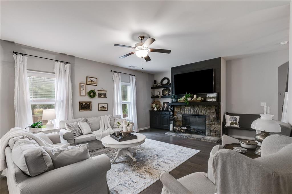13 Westbrook Road Carrollton, GA 30116 - Photo 13 of 39 a living room with furniture and a flat screen tv