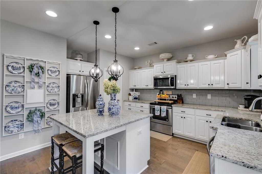 13 Westbrook Road Carrollton, GA 30116 - Photo 18 of 39 a large kitchen with granite countertop lots of counter top space