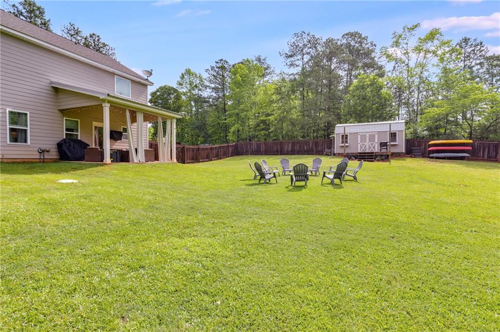 13 Westbrook Road Carrollton, GA 30116 - Photo 31 of 39 a view of a house with a yard and sitting area
