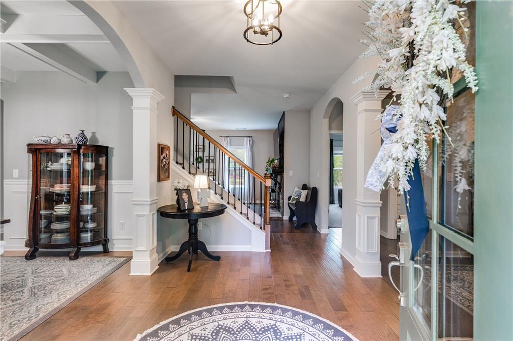 13 Westbrook Road Carrollton, GA 30116 - Photo 7 of 39 a view of an entryway with wooden floor and stairs
