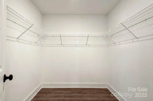 a view of a room with racks on the wall