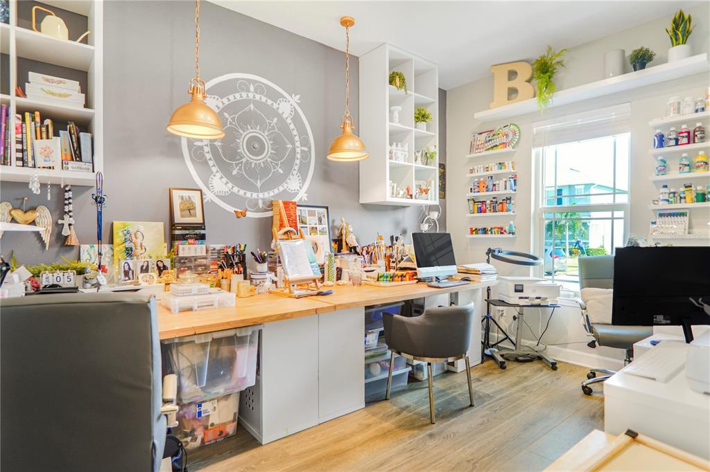 694 Brooks Field Drive Winter Garden, FL 34787 - Photo 12 of 74 a very nice looking living room with a large window and a dining table