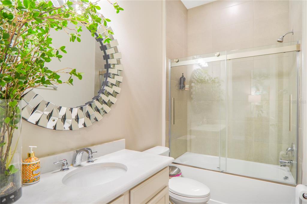 694 Brooks Field Drive Winter Garden, FL 34787 - Photo 16 of 74 a bathroom with a sink toilet and shower