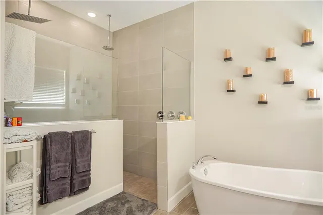 a kitchen with granite countertop white cabinets and a sink