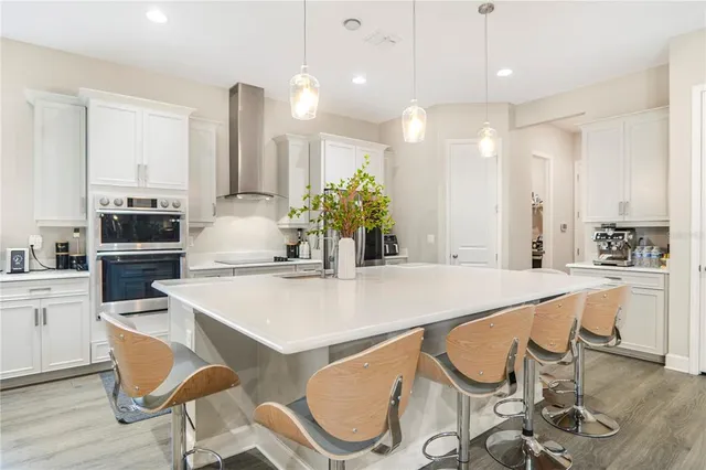 a bedroom with a bed and a cabinets