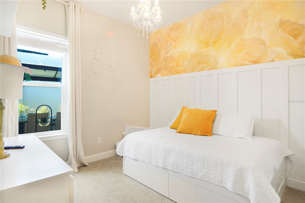 694 Brooks Field Drive Winter Garden, FL 34787 - Photo 40 of 74 a bedroom with a bed and a cabinets