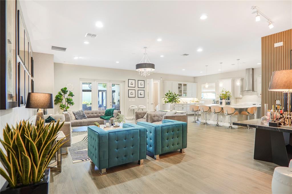 694 Brooks Field Drive Winter Garden, FL 34787 - Photo 4 of 74 a living room with furniture large window and wooden floor