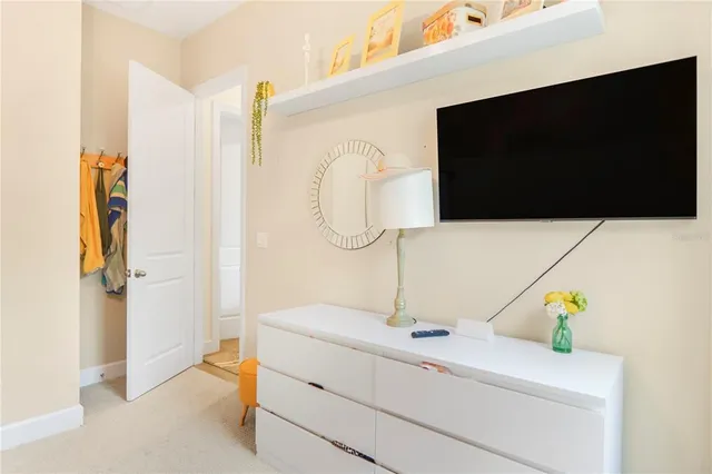 a living room with a couch and a flat screen tv
