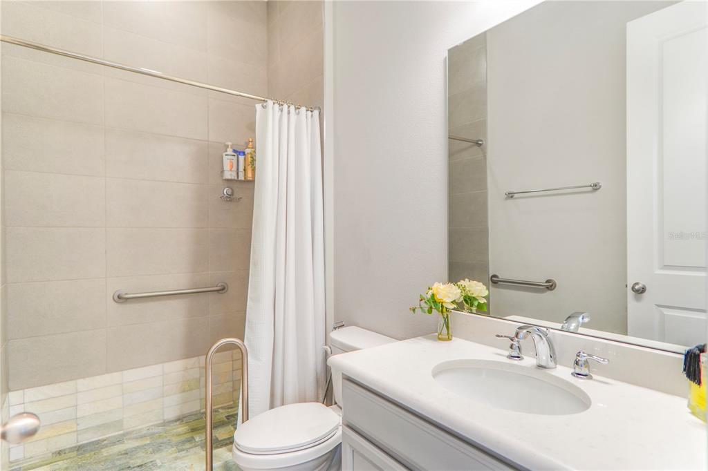 694 Brooks Field Drive Winter Garden, FL 34787 - Photo 43 of 74 a bathroom with a sink toilet and shower