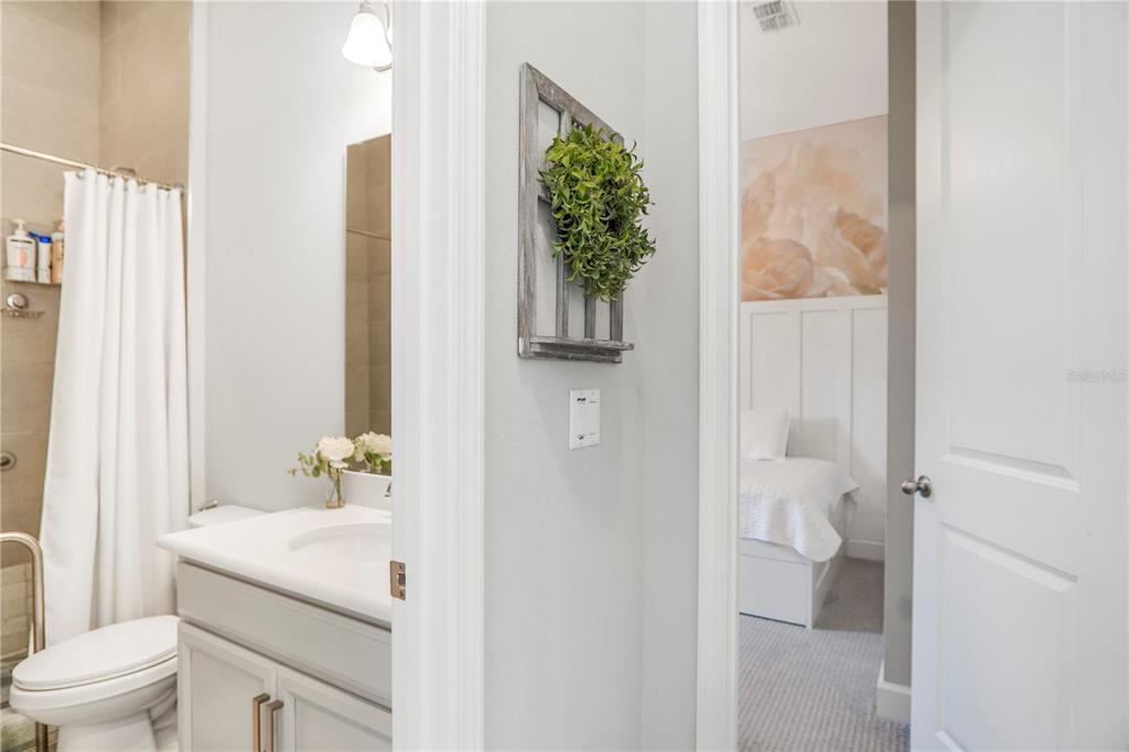 694 Brooks Field Drive Winter Garden, FL 34787 - Photo 44 of 74 a bathroom with a sink toilet and shower