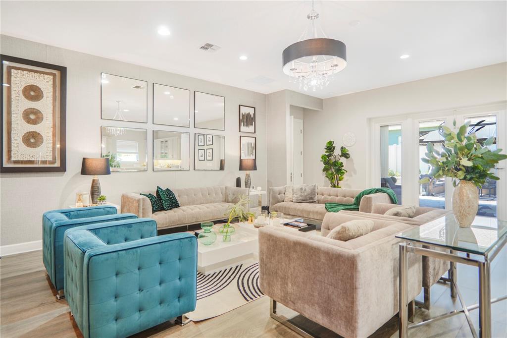 694 Brooks Field Drive Winter Garden, FL 34787 - Photo 5 of 74 a living room with furniture and a large window