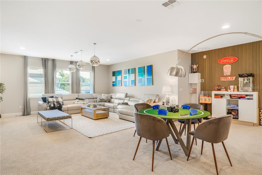 694 Brooks Field Drive Winter Garden, FL 34787 - Photo 51 of 74 a living room with fireplace furniture and a potted plant