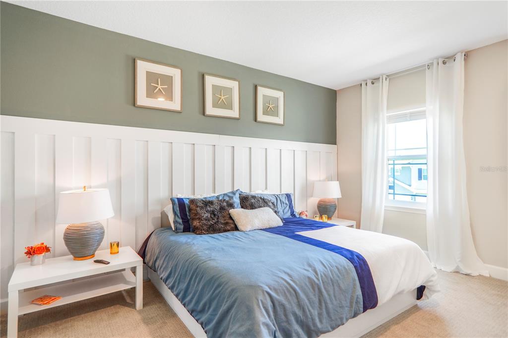 694 Brooks Field Drive Winter Garden, FL 34787 - Photo 54 of 74 a bedroom with a bed and a window