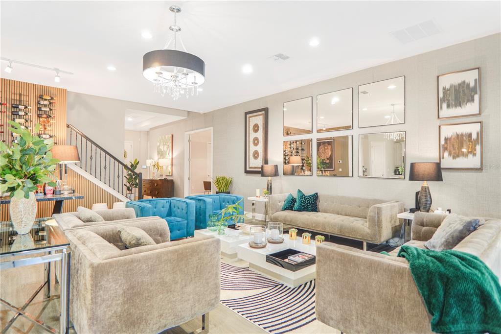 694 Brooks Field Drive Winter Garden, FL 34787 - Photo 6 of 74 a living room with furniture and a large window